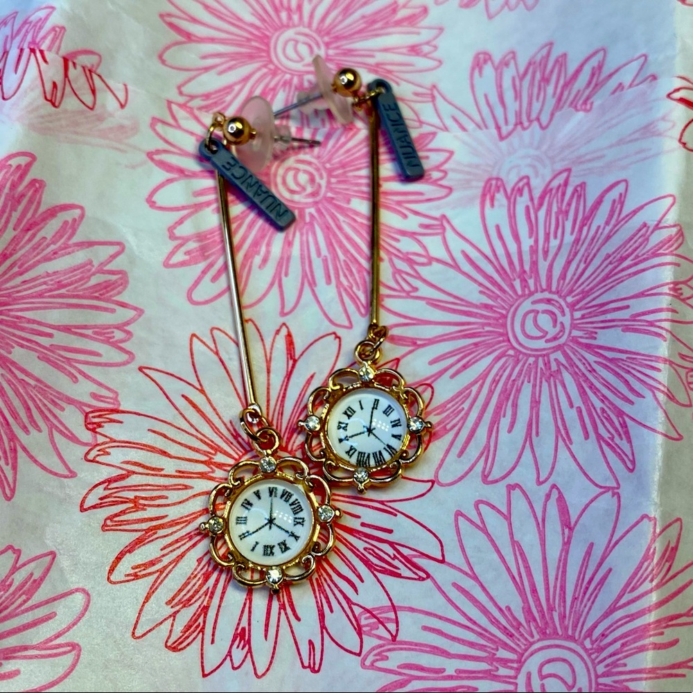 Long clock earrings